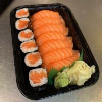107. Salmon Lover · 7 pieces of salmon sushi and a salmon roll.