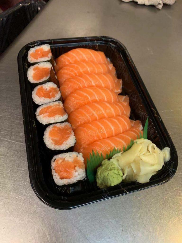 107. Salmon Lover · 7 pieces of salmon sushi and a salmon roll.
