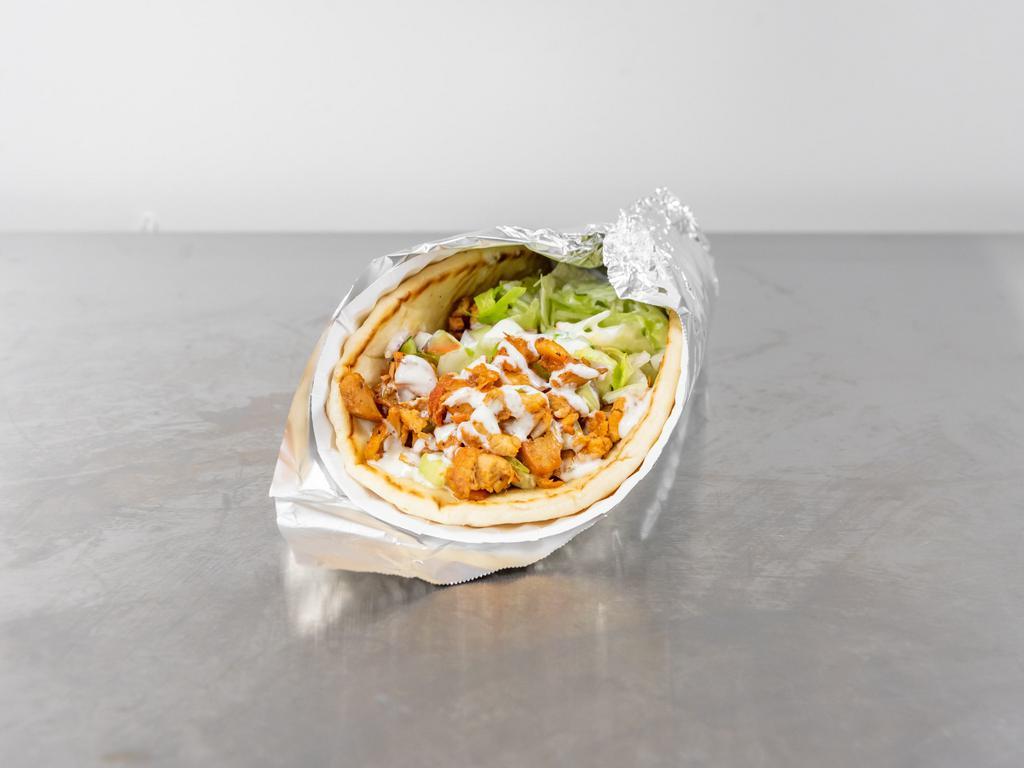 Mix Gyro · A mixture of our juicy chicken and tender lamb gyro meats served on a fresh pita and toppings