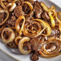 Bistek · made of thinly sliced beef marinated and braised in a mixture of lemon and calamansi, soy sa...