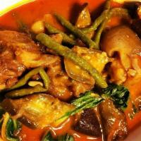 Oxtail Kare-Kare · made with simmered oxtail, vegetables and peanut-based sauce serve with bagoong 
