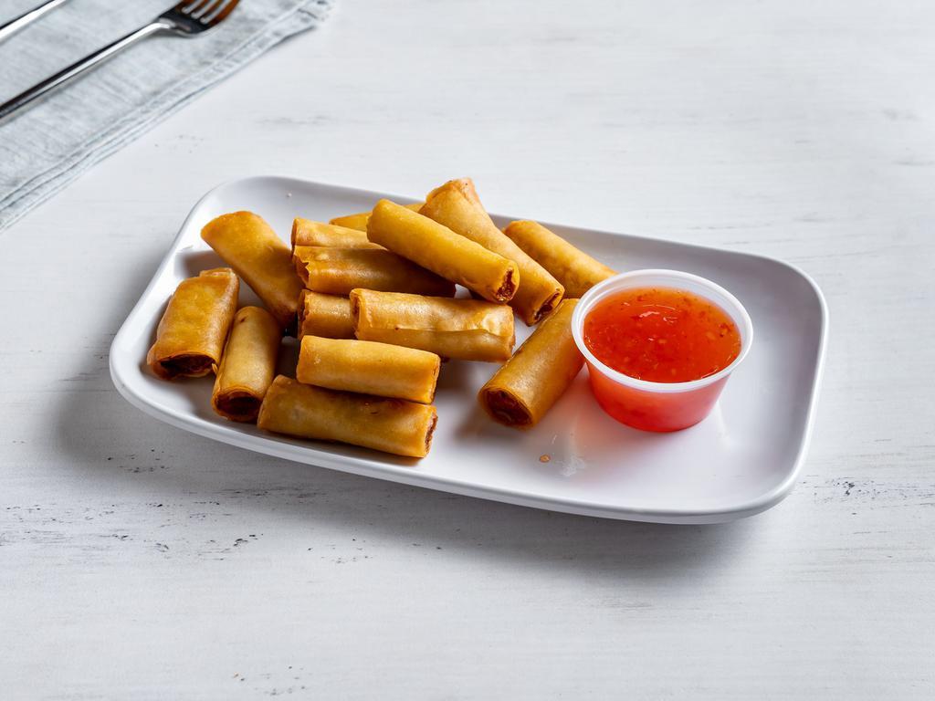 Lumpia Shanghai · Filipino Spring Rolls with pork, carrots and onions serve with sweet and chili sauce