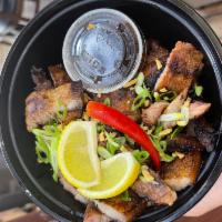 Grilled Liempo · grilled pork belly that are 
marinated in lemon, soy sauce and spices