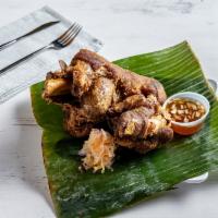 Crispy Pata · deep fried pig trotters or knuckles served with a soy-vinegar dip.