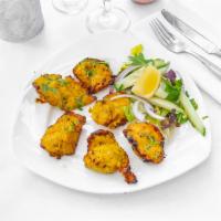 Chicken Tikka · Boneless pieces of chicken cubes marinated with spices, herbs, ginger, and garlic paste and ...