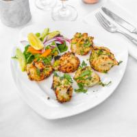 Malai Tikka Lasooni · Boneless cubes of chicken marinated in a paste of garlic, cream cheese, herbs, spices and br...