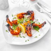 Tandoori Shrimp · Fresh tiger prawns marinated in Kashmiri chili paste, ginger, garlic, coriander powder and c...