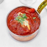 Chicken Tikka Masala · Boneless cubes of chicken marinated and grilled in a clay oven and simmered in a tangy sauce...