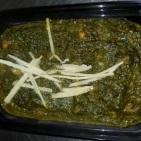 Chana Sag  · Kabuli chick peas cooked with onion, ginger, garlic, tomatoes, cumin, coriander, red chilis,...