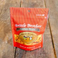Cashew Brittle · What do you get when you take whole jumbo cashews no chips or pieces here and cover them wit...