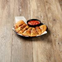 Create Your Own Calzone · Our signature dough filled with up to 4 toppings of your choice and mozzarella, Parmesan and...