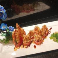 Angry Dragon Roll · Shrimp Tempura and avocado inside, wrapped with soy paper, with crunchy spicy crab on top, s...