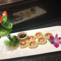Naruto Roll · Tuna, salmon, yellowtail, and avocado, wrapped with thinly sliced cucumber, scallions and ca...
