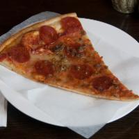 Pepperoni Pizza · Zesty pepperoni with tangy homemade tomato sauce and mozzarella cheese.