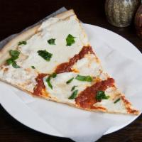 Margarita Pizza · Fresh mozzarella cheese, tomato sauce and fresh basil.