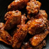 Teriyaki Wings · Crispy and flavorful classic chicken wings with Buffalo flavor packed sauce.