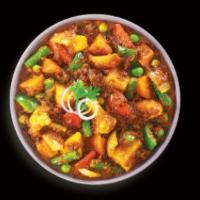 79. Mix Vegetable Curry · Vegan and gluten-free. Mixed vegetables seasoned in medium thick curry.