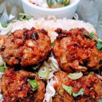 ប្រហិតសាច់​មាន់ជាមួយសាច់គោ Chicken and Beef Khmer Meat Ball · 4 of oven baked fresh lemongrass spices Chicken/beef meatball Serve with sticky rice steamed...