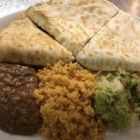 Beef Quesadilla Plate · Large flour tortilla folded and filled with shredded cheddar cheese and your choice of groun...
