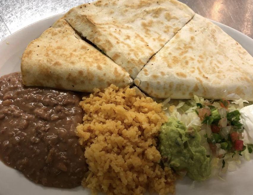 Beef Quesadilla Plate · Large flour tortilla folded and filled with shredded cheddar cheese and your choice of ground beef or shredded chicken.