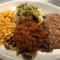 Bistec Rancheo Plate · Grilled steak topped with ranchero sauce and grilled onions.