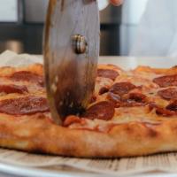 10” New York Style Pizza · Our Signature Marinara Sauce, Proprietary Four Cheese Blend, NY style dough