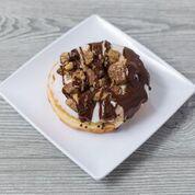 PB Cup Donut · Vanilla icing, Reese's peanut butter cups and a dark chocolate drizzle.