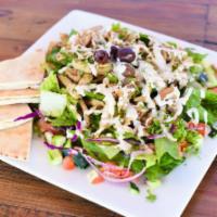 chicken salad  · Romaine lettuce, tomatos, onions, cucumbers, olives and pickles tossed in  our house made dr...