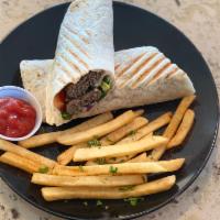  2 sheesh kabab wrap · two lamb and beef kafta kabob with hummus, lettuce, tomatoes ,onions and fries.