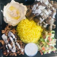 Shawarma Combo Plate ·  Chicken shawrma, and gyro  (beef+lamb) Served with  hummus, or Baba ganoush,bread,  rice an...