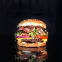 Smoked Bacon Cheeseburger · Beef patty, bacon, cheddar cheese, lettuce,  tomato, onion, pickles, mayo on a toasted bun.
