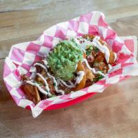 The Taco Party Wings · Wings tossed in taco seasoning. Topped with bacon bits, green onions, shredded cheese, jalap...