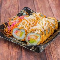 Krazy Kamikaze Roll · kani tempura, avocado, pickled julienne onions topped w kani salad