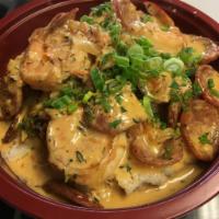 Shrimp ‘n Grits · Move over gumbo ‘cuz Shrimp ‘n Grits might take your spot as our signature dish. First we st...