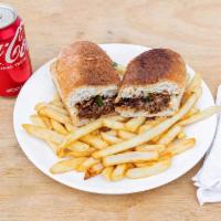 2. Philly Cheesesteak Sandwich with French Fries · Steak, cheese, and caramelized onion sandwich.