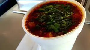 Consome · Birria broth in a 12 oz cup. no meat.
