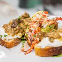 DUETTO DI BRUSCHETTA · Bruschetta “guacamole and lobster” and “burrata, porcini mushrooms and truffle