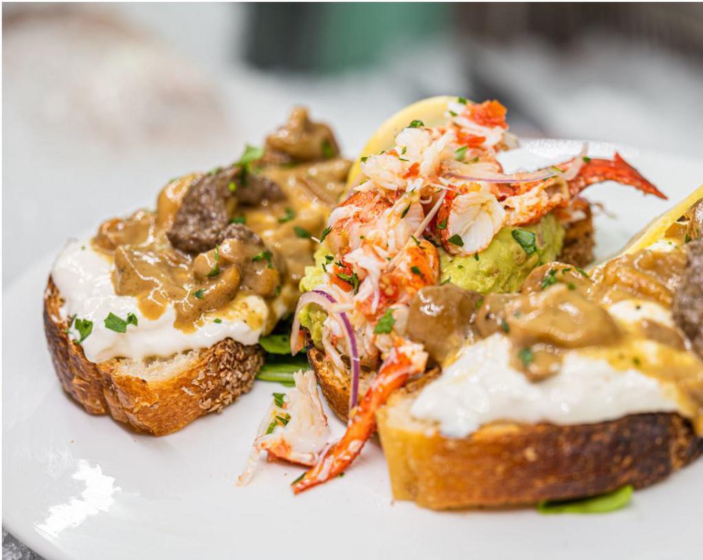 DUETTO DI BRUSCHETTA · Bruschetta “guacamole and lobster” and “burrata, porcini mushrooms and truffle
