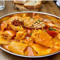 PACCHERO AI TRE CROSTACI  · Paccheri with scampi langoustine, lobster and shrimp