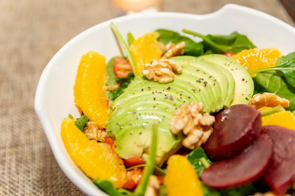 INSALATA PICCOLA CUCINA · Baby Spinach, beets, orange, avocado, toasted nuts and dried fruits
