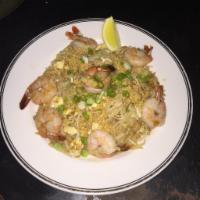 21. Phad Thai · Ever popular Thai rice noodle with shrimp, tofu, scallions, bean sprouts sauteed with egg an...