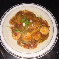 22. My Thai Pasta · Chicken breast and shrimp in Thai sweet and sour sauce topped on linguine.