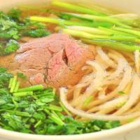 S1. Filet Mignon Pho · Pho noodle soup with filet mignon steak.