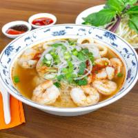 S2. Seafood Pho · Hot and sour pho noodle soup with shrimp, fish, and squid.