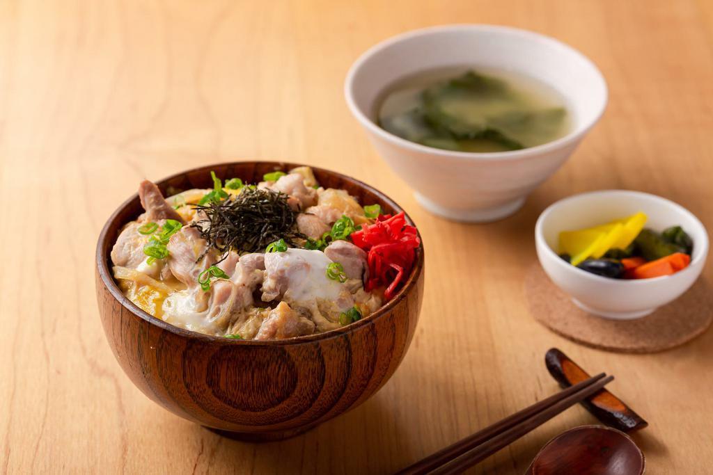 Oyako Don · Simmered chicken & egg on top of rice served with miso soup & green salad.