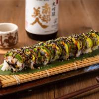 Dragon Roll · Eel, kani and cucumber top with avocado.