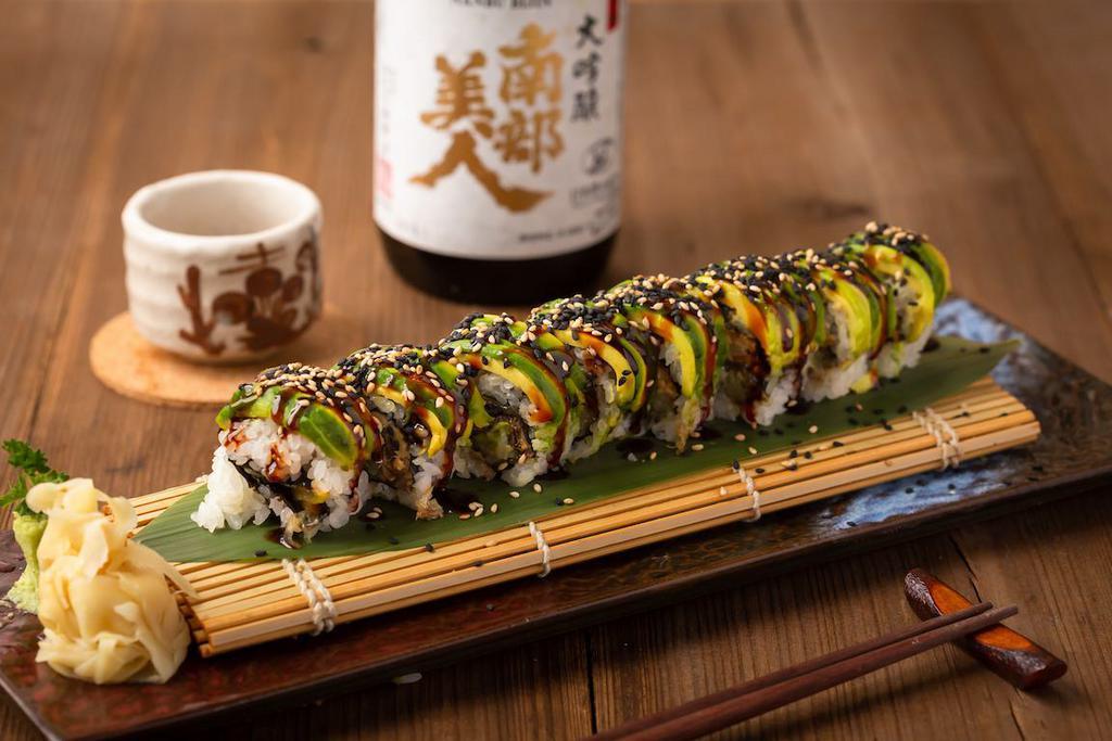 Dragon Roll · Eel, kani and cucumber top with avocado.