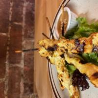 Chicken Satay Tapas Lunch · Cooked in coconut milk, yellow curry, cilantro and lemongrass, served with spicy cacahuate s...
