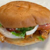 Buffalo Chicken Torta · Grilled chicken stips drenced in our homemade red hot Buffalo sauce served with cheddar chee...