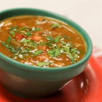 Charro Beans · Spicy pinto beans soup.